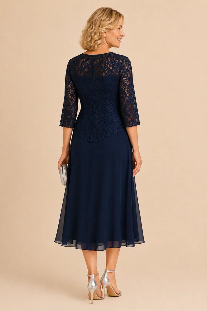 Robe mi-longue asymétrique en mousseline et dentelle perlée