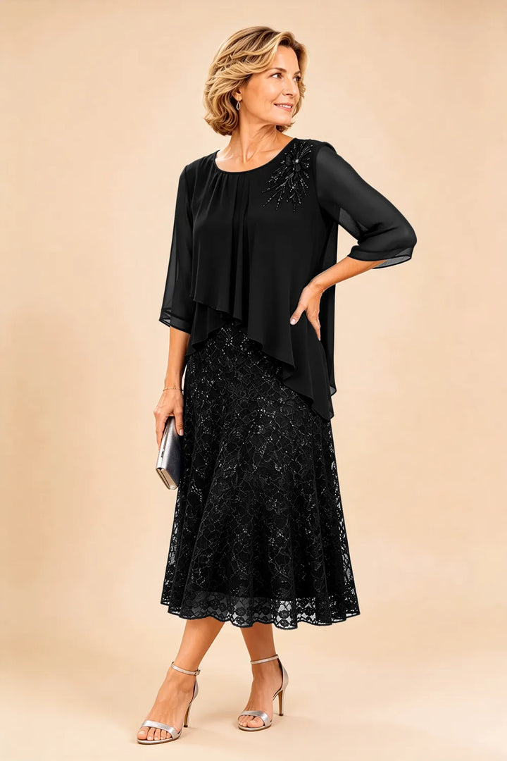 Robe de cérémonie en mousseline et dentelle superposée