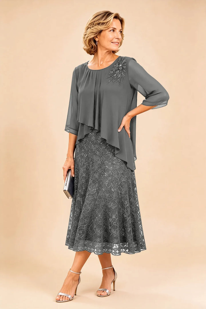 Robe de cérémonie en mousseline et dentelle superposée
